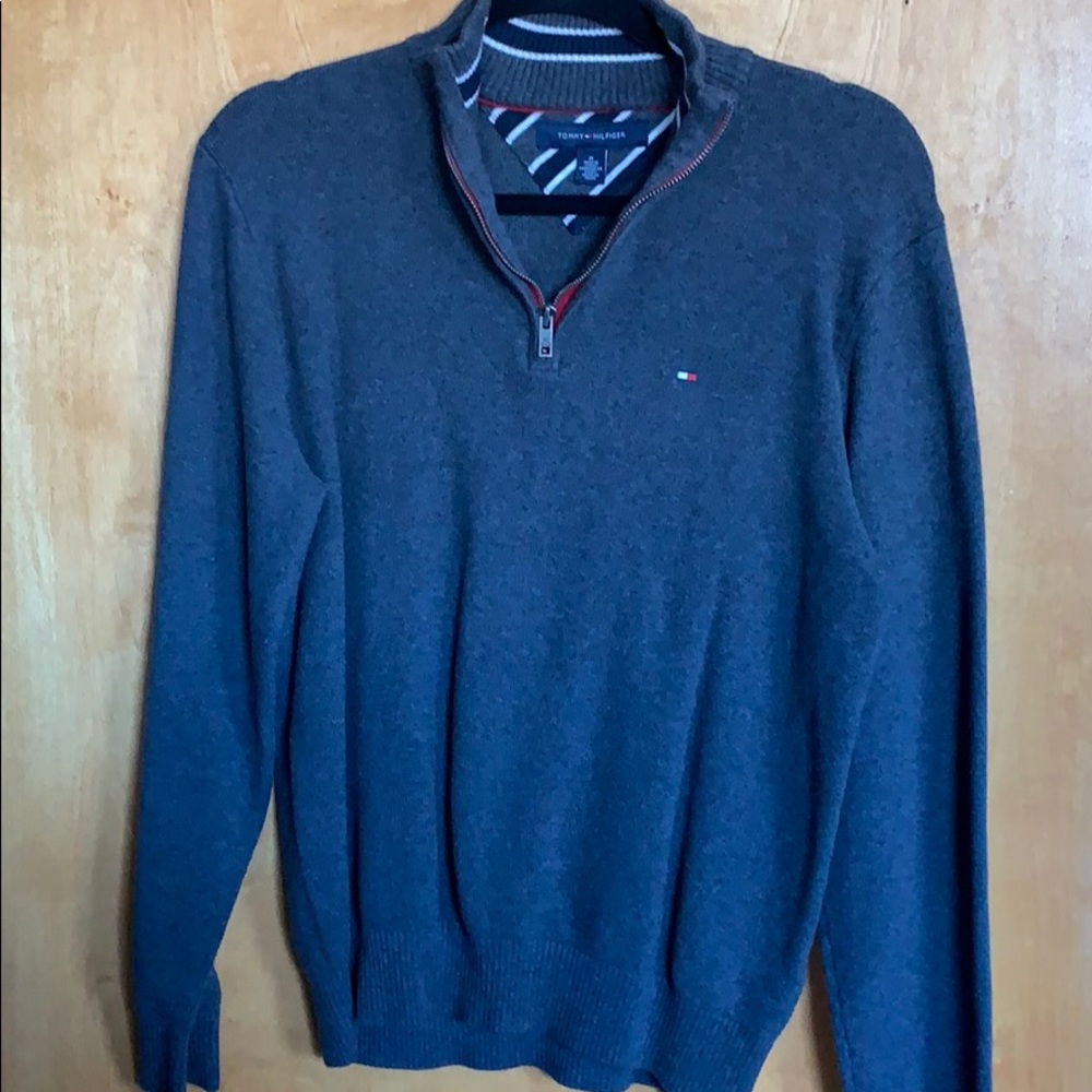 Dark grey sweater.